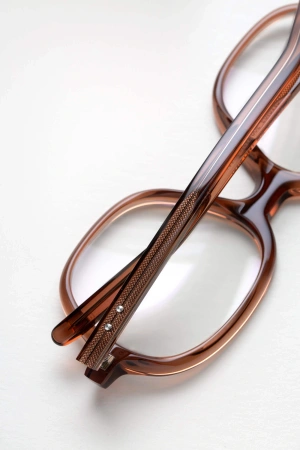 Damskie / Męskie okulary korekcyjne Oscar Magnuson - Jane OM1 - 905 Crystal Brown