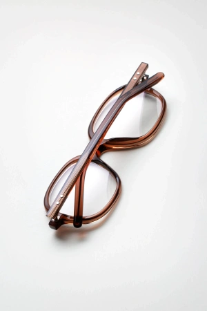 Damskie / Męskie okulary korekcyjne Oscar Magnuson - Jane OM1 - 905 Crystal Brown